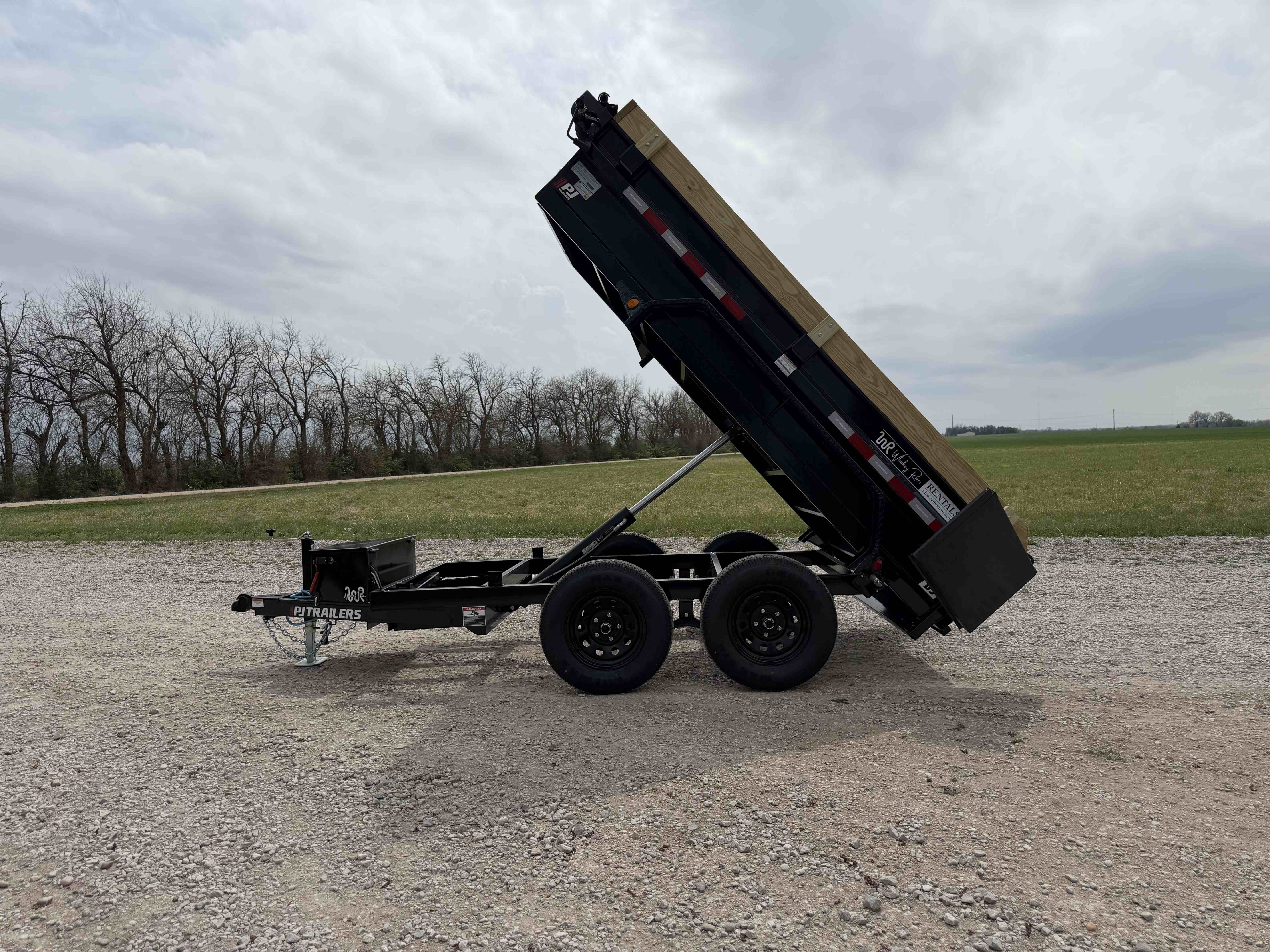5x10 PJ D5 Dump Trailer - Professional trailer rental for PJ Trailers model with 7,000 lbs GVWR
